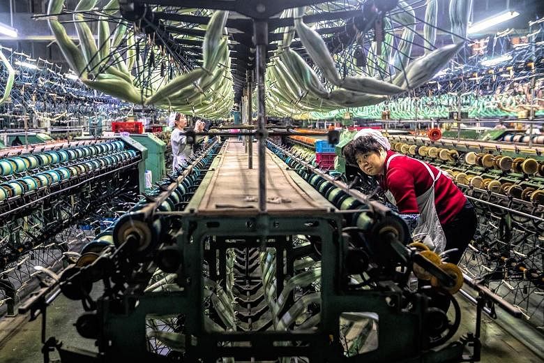 A garment factory in Jiangsu province. While most analysts believe the worst may be over for China's economy, last month's disappointing factory data - which followed surprisingly upbeat March figures - suggested it is still struggling for traction. 