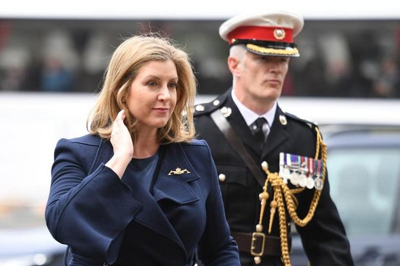 Swimsuits and innuendo: Britain's new female Defence Secretary Penny ...