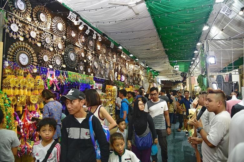 Visitors to this year's Hari Raya Bazaar in Geylang Serai will enjoy wider walkways as they browse through the greater proportion of traditional offerings. The bazaar will run till Hari Raya Puasa on June 5.