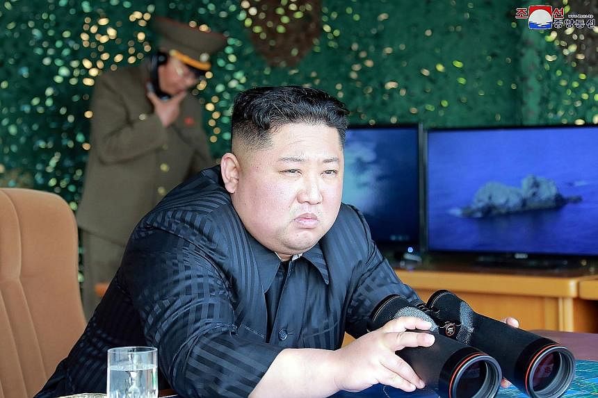North Korea testing weapons at an undisclosed location in the country last Saturday, in a photo released by the official Korean Central News Agency. The live-fire military exercise potentially included the North's first ballistic missile launch since