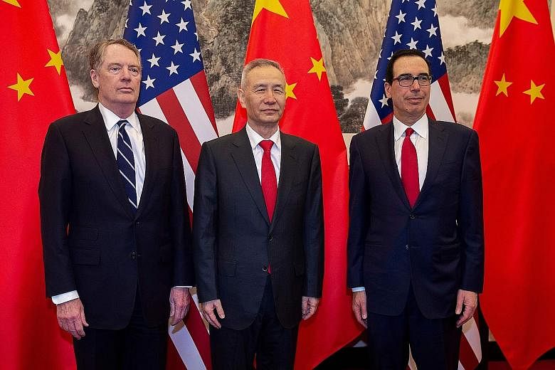 US Trade Representative Robert Lighthizer with China's Vice-Premier Liu He in Beijing in March. The Chinese delegation, including Mr He, will head to Washington for trade talks, which will begin tomorrow, a day later than previously scheduled.