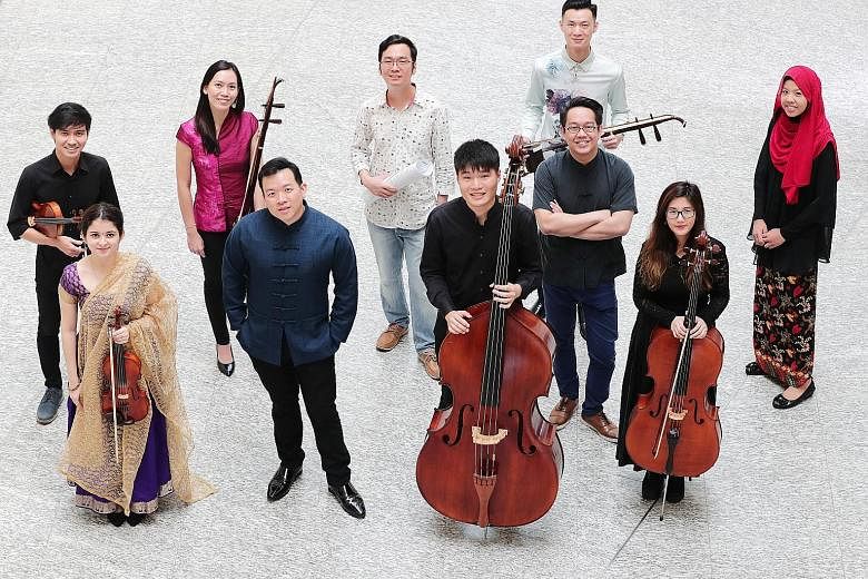 Front row, from left: Sharanya on the Indian violin, conductor Adrian Chiang, Edmund Song on the double bass, conductor Dedric Wong and Melissa Ong on the cello. Back row, from left: Gabriel Lee on the violin, Rozie Hoong on the erhu, composer Wang C