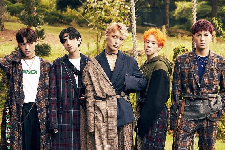 South Korean boy band A.C.E, comprising (above, from far left) Chan, Wow, Jun, Byeongkwan and Donghun, are known for their bold and colourful stage costumes.