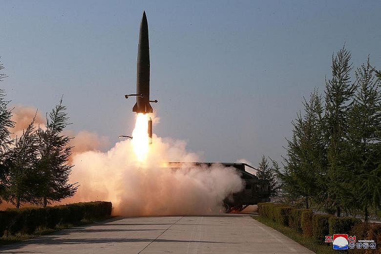 A missile being launched during a military drill in North Korea, in this photo supplied by state news agency Korean Central News Agency yesterday. Pyongyang, reeling from the shock of a failed summit with US President Donald Trump in Hanoi, has rampe