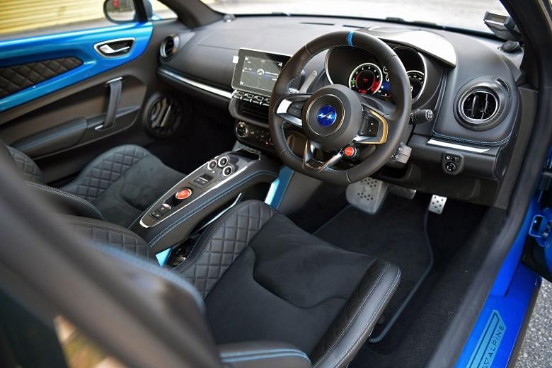 In the Alpine A110, the one-piece bucket seats are comfortable and there is a generous array of modern amenities. The handsome rear, with its flared haunches and squat posture, contributes to the car’s unshakeable roadholding. 