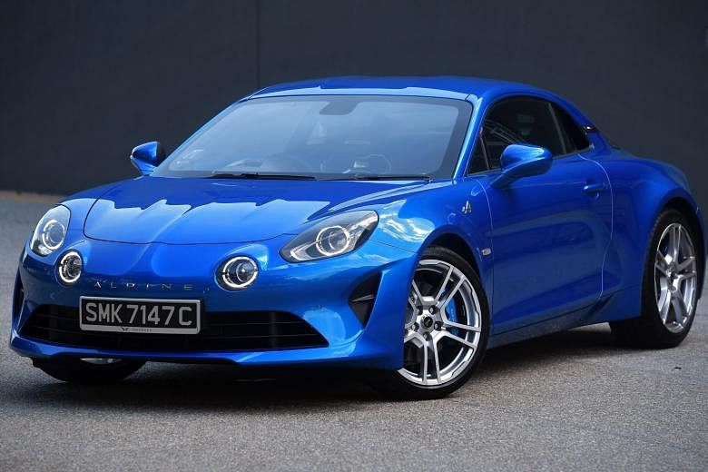 In the Alpine A110, the one-piece bucket seats are comfortable and there is a generous array of modern amenities. The handsome rear, with its flared haunches and squat posture, contributes to the car’s unshakeable roadholding.