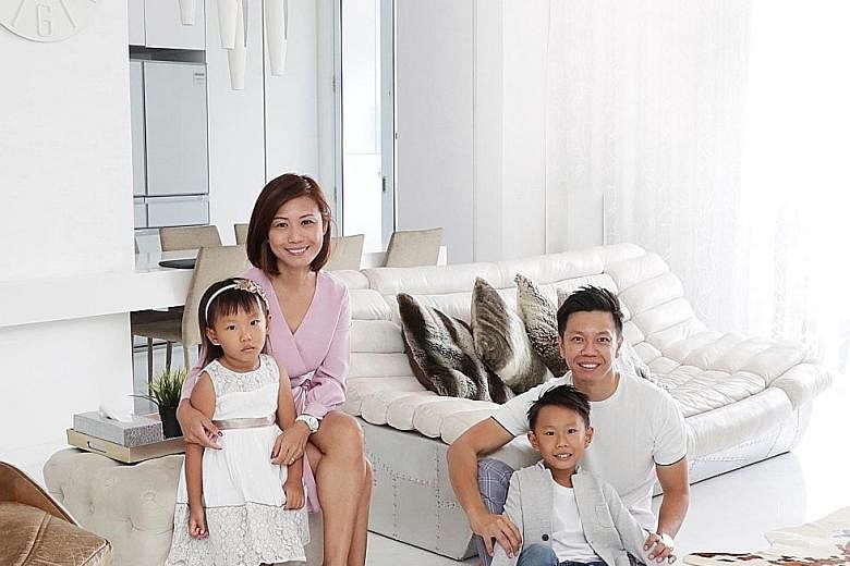 Mr Eugene Soo, 37, an estate planner at Rockwills International, with his wife, Ms Ho Siew Ling, 38, a financial adviser, and their children - Esben, eight, and Esther, five. Mr Soo has established a family trust that aims to preserve the family weal