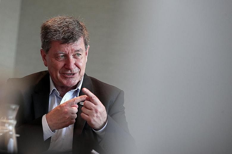 International Labour Organisation director-general Guy Ryder is less concerned about jobs being lost to technology than the challenges in preparing workers so they can function in the new economy. ST PHOTO: KELVIN CHNG