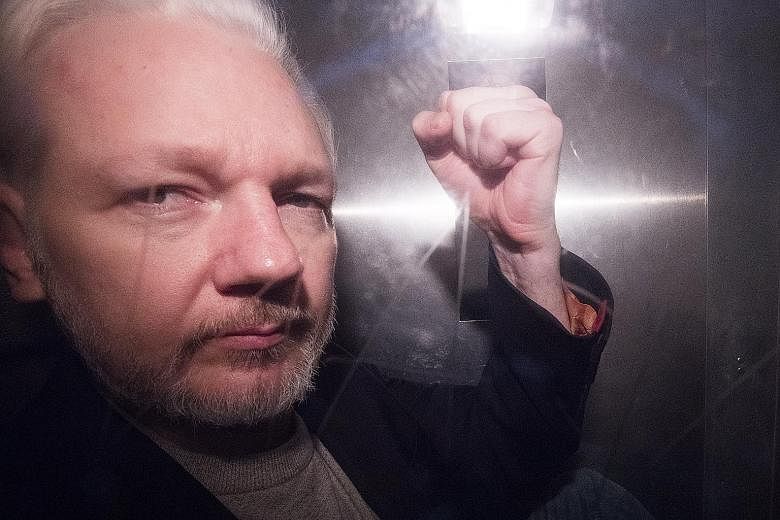 WikiLeaks co-founder Julian Assange in a prison van in London earlier this month. Sweden and the US are seeking to extradite him.