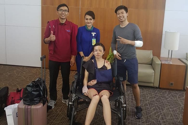 Mr Eugene Aathar and Ms Dolly Ho (above) at the airport with a MediVac Asia representative (in red) and an airport ground employee, and at Siloam Hospital Denpasar (right).