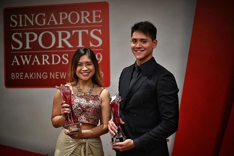 The winning feeling gets better each time for Sportsman of the Year Joseph Schooling, while it has not sunk in yet for first-time Sportswoman of the Year Martina Veloso. ST PHOTO: ARIFFIN JAMAR