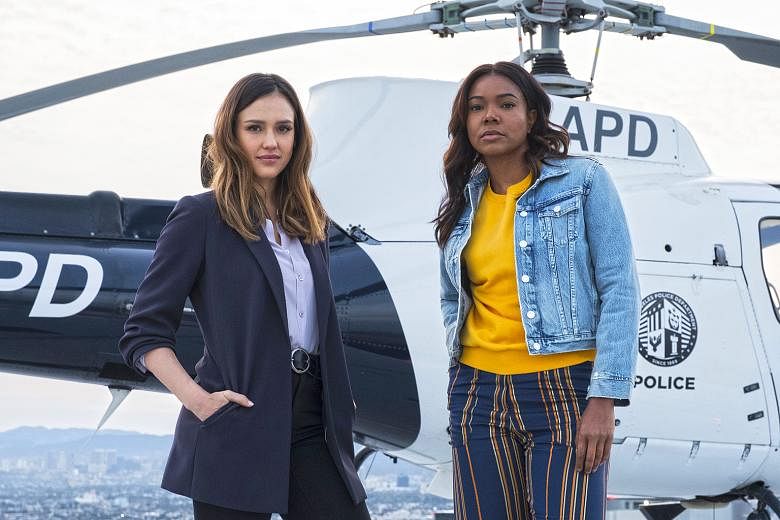 Jessica Alba (left) and Gabrielle Union (right) play tough-as-nails police officers with complicated histories in the new series, L.A.'s Finest.