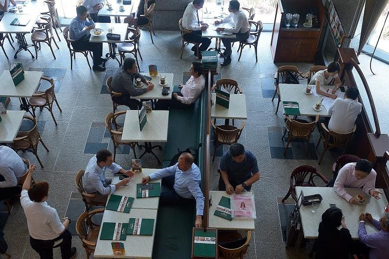 Customers at the Dome Cafe once located in UOB Tower 1 at Raffles Place. The casual bistro will close its last outlet in Singapore, at Parkway Parade, on June 23.