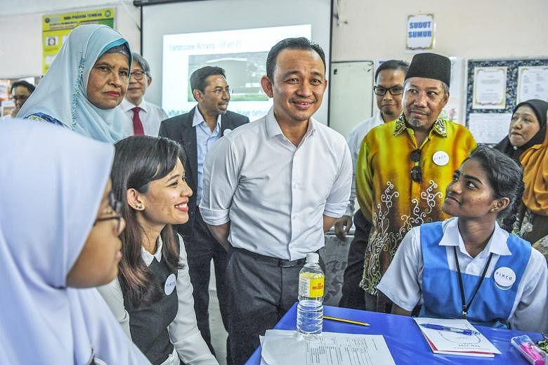 Education Minister Maszlee Malik (centre) announced on April 24 that places in the public pre-university programme, commonly referred to as matriculation, will be increased from 25,000 now to 40,000. But the current admission quota that reserves 90 p