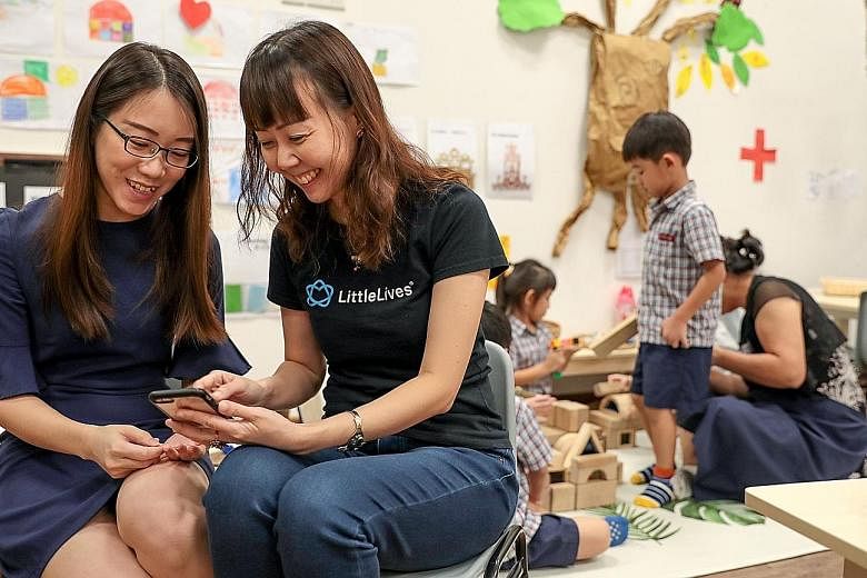 LittleLives app founder Sun Ho (right) with principal of E-Bridge Pre-School (Bukit Panjang), Ms Chua Chai Yun. LittleLives, a pre-school management app, has launched a payment feature that will save pre-school operators up to 40 hours a month on pay