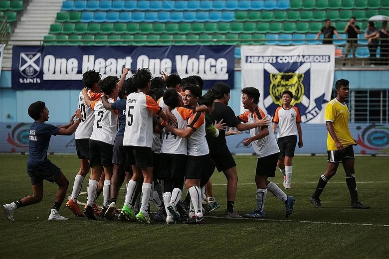 SAJC players rejoicing after beating VJC 4-1 for their school's first football title at the Jalan Besar Stadium yesterday. They had also beaten the defending champions 1-0 in a quarter-final round-robin match. ST PHOTO: JASON QUAH