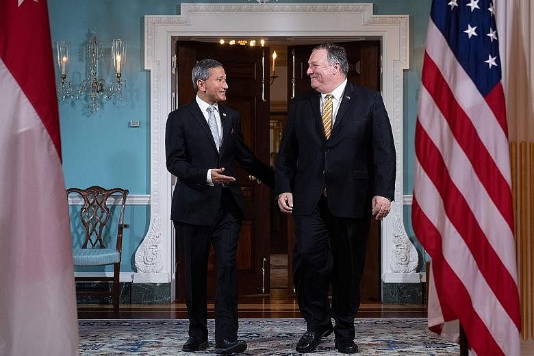 Foreign Minister Vivian Balakrishnan arriving alongside US Secretary of State Mike Pompeo prior to meetings at the State Department in Washington on Thursday. Dr Balakrishnan said Singapore's ties with the US are excellent and their defence relations