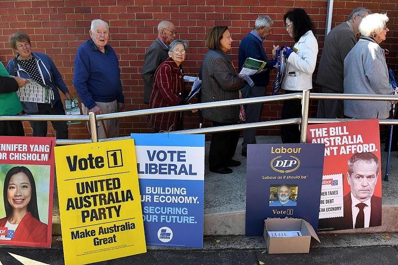 Pre-poll voters waiting to cast their ballots in the seat of Chisholm in Melbourne. Despite Australia enjoying 27 years of economic growth, voters appear inclined to switch to the Labor party following six tumultuous years in which the Coalition has 