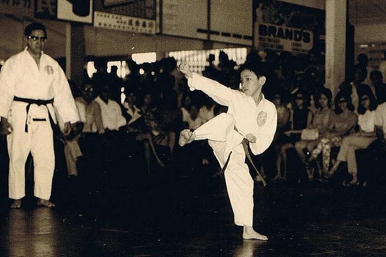 Ms Chew performing karate moves as a child, under the watchful eyes of her late father Chew Choo Soot, a karate grand master. After recovering from depression brought on by work stress and family issues, Ms Angie Chew, in 2012, set up Brahm Centre, a