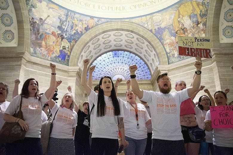 Abortion rights activists protesting last Friday after Missouri state passed a Bill that bans abortions the moment a foetal heartbeat is detected. PHOTO: NYTIMES
