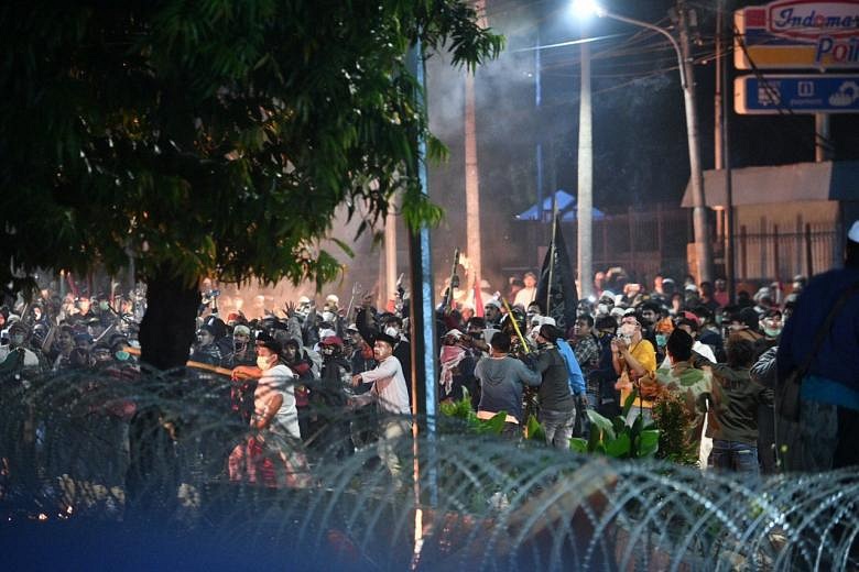 6 Killed, 200 Injured In Jakarta Election Protests That Police Say Are ...