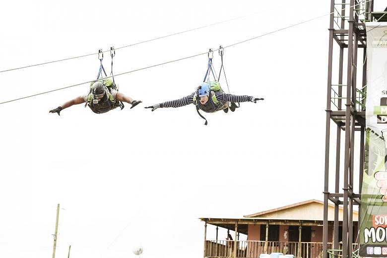 In one episode of The Tonight Show in January, a petrified Jimmy Fallon (left), together with rapper Tariq "Black Thought" Trotter (far left), had to ride the Toro Verde Zip Line in hurricane-torn Puerto Rico to raise awareness of the island's plight