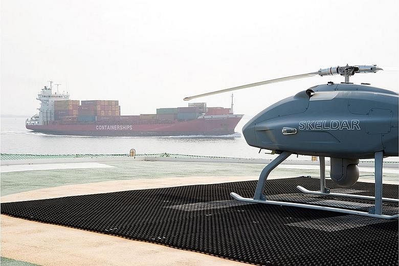 Many ports around the world are looking at using "sniffer drones" to enforce new rules aimed at cutting air pollution caused by ships. PHOTO: SKELDAR