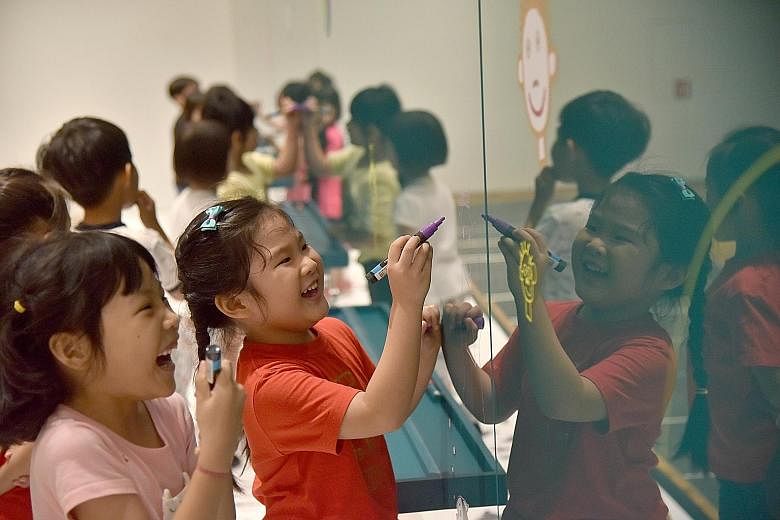 Children having fun in Big Hug, a multi-room installation that has more than 30 interactive activities. ST PHOTO: JASMINE CHOONG