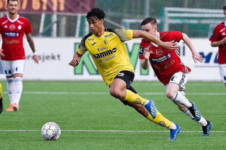 Left: Ikhsan Fandi has scored two goals in seven substitute appearances for Raufoss since his signing in January. Below: Ikhsan helps out although flatmate Parfait Bizoza, a defender, does most of the cooking at home.