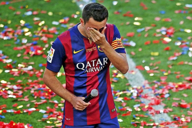 Ex-Barcelona midfielder Xavi left his boyhood club in 2015 but hopes to return to coach his former team, with whom he won every club honour in Spain. PHOTO: REUTERS