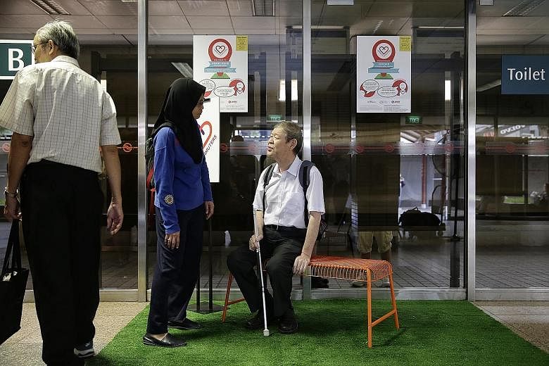 By the end of this year, all MRT stations will have priority queues for seniors, expectant mothers, wheelchair users and parents travelling with strollers. Major transport facilities will soon have signs in Braille and larger fonts. ST FILE PHOTO