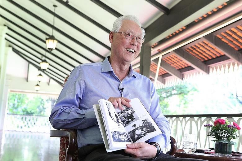 Emeritus Senior Minister Goh Chok Tong with a Chinese-language copy of his biography, Tall Order: The Goh Chok Tong Story, during an interview at the Istana with Lianhe Zaobao that was published in the Chinese daily yesterday. PHOTO: LIANHE ZAOBAO