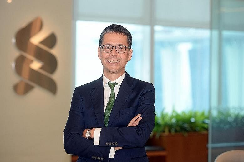 StanChart (Singapore) chief executive Patrick Lee says technology is a big driver for the lender to be more efficient.