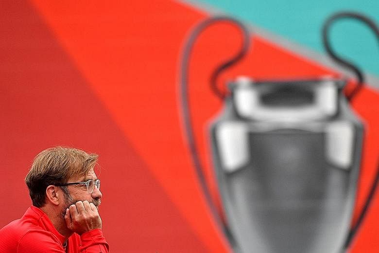 Liverpool manager Jurgen Klopp speaking about the Champions League final during a press conference at the club's Melwood training ground on Tuesday. In Madrid on Saturday, the Reds will play Tottenham. PHOTO: AGENCE FRANCE-PRESSE