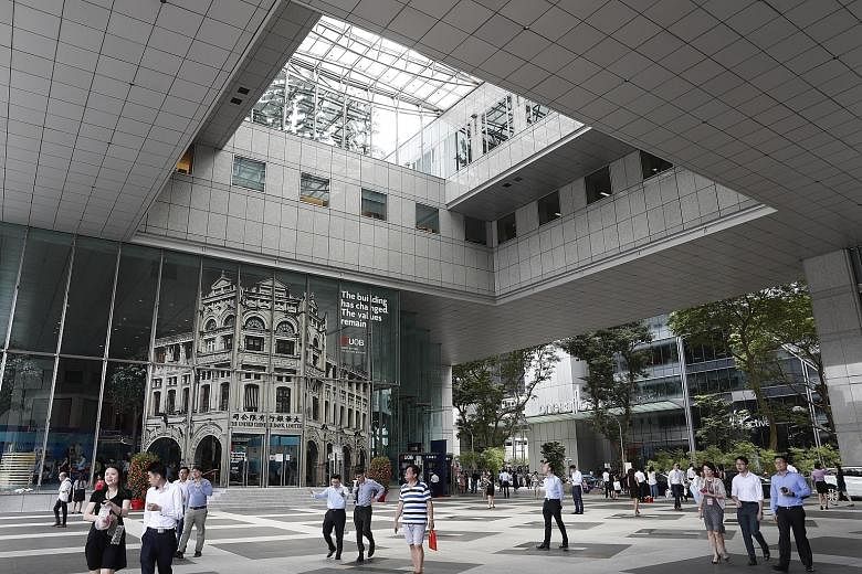 UOB PLaza in Raffles Place. For its expansion in the region, the bank is planning to use digital technology and artificial intelligence, rather than acquisitions, says its chief executive officer Wee Ee Cheong.