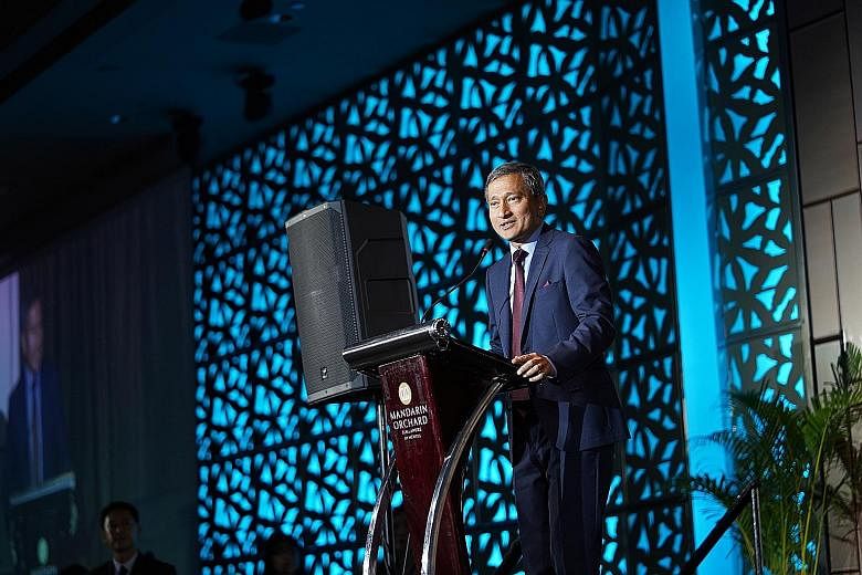 Foreign Minister Vivian Balakrishnan speaking at the event yesterday. Referring to families, he said that "a society is formed when there are units that are totally committed to one another". PHOTO: FOCUS ON THE FAMILY SINGAPORE