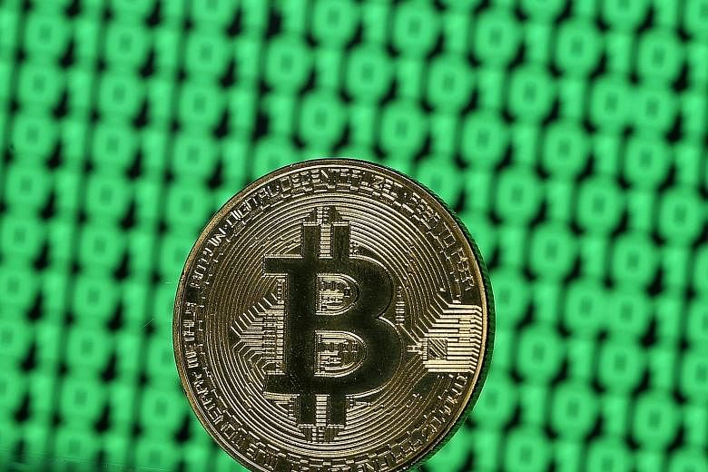 Data suggests that hardly anyone is using bitcoin for anything beyond speculation. PHOTO: REUTERS