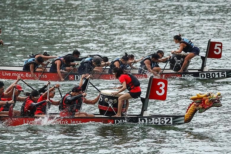KPMG Dragonboat A (No. 5) pipped defending champions DBS Bank Ltd A (No. 3) to the 200m corporate mixed title at The Promontory @ Marina Bay yesterday.