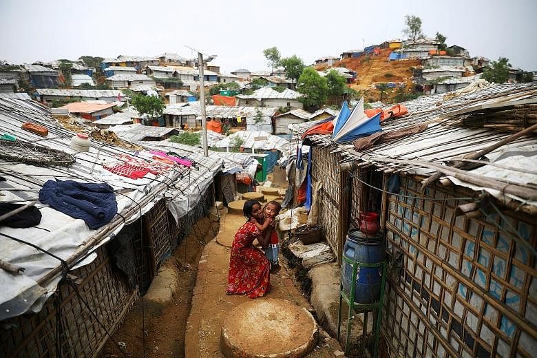 Rohingya children at a refugee camp in Cox's Bazar, Bangladesh. Malaysian Defence Minister Mohamad Sabu highlighted the large movement of Rohingya refugees as a regional challenge, saying: "No longer is the situation in Rakhine (in Myanmar) a domesti
