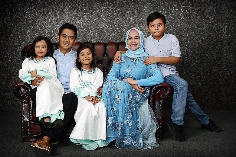Mr Aditya, in a photograph taken earlier with his wife Dewi and their children (from left) Bianca Indira, Calista Zora and Junot Arthaf.