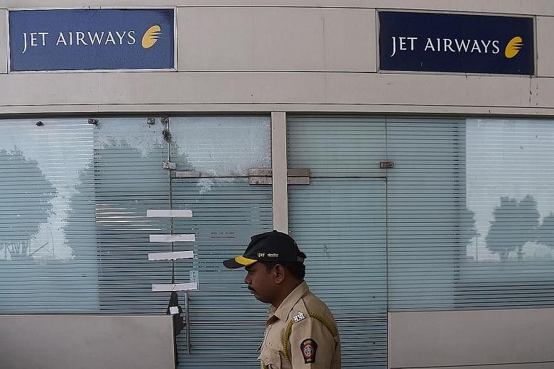 A closed Jet Airways office at Chhatrapati Shivaji Maharaj International Airport in Mumbai. Jet Airways, which halted operations in April after running out of cash, had a market share of about 12 per cent on international flights to and from India la