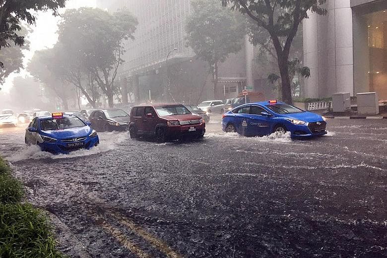Pickering Street was among the areas hit by a heavy downpour at about 1.30pm yesterday. Meanwhile, moderate to heavy showers were reported mostly in Queenstown, Kallang and the city area. The Weather@SG app by the Meteorological Service Singapore (MS