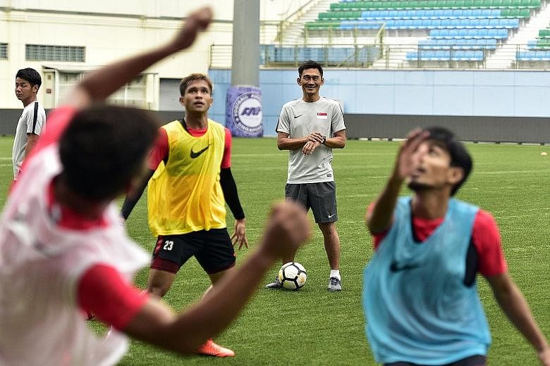 Singapore assistant coach Nazri Nasir with the Lions squad during training at Jalan Besar Stadium on Monday. He says his short stint as caretaker coach was a good learning experience.