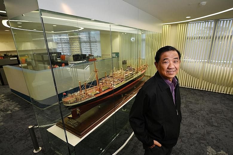 After a decade out at sea, Mr Rosli joined Jurong Shipyard (above) as a dockmaster for two years, before joining Singapore Polytechnic as a nautical studies lecturer. ST FILE PHOTO Mr Rosli Ridzwan with a model of the M.V. Anchises, a general cargo s