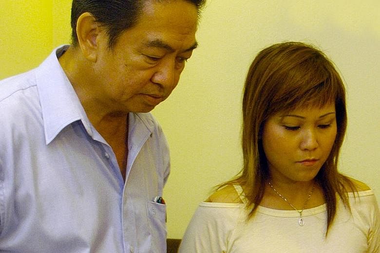 Mr Roland Tay will now own 100 per cent of the two Lavender Street shophouses. This ends a protracted court battle with his former wife, Madam Sally Ho (below), over the couple's assets.