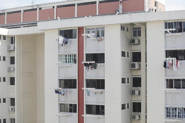 Ms Letecia, who works as a maid in a unit opposite Block 637 Ang Mo Kio Avenue 6, said the girl was spotted in the kitchen (far left, second unit from top) where the window grilles were open. PHOTO: LIANHE ZAOBAO
