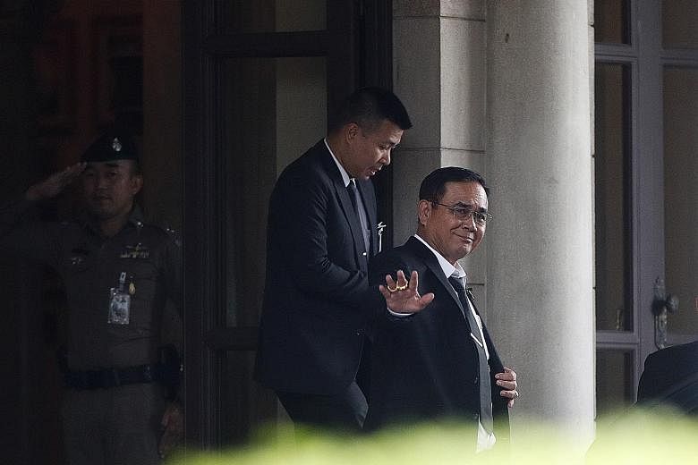Thai Prime Minister Prayut Chan-o-cha leaving Government House in Bangkok yesterday. The former army chief was nominated for the premiership by Palang Pracharath Party, which spent weeks cobbling together a 19-party coalition with a slim Lower House 