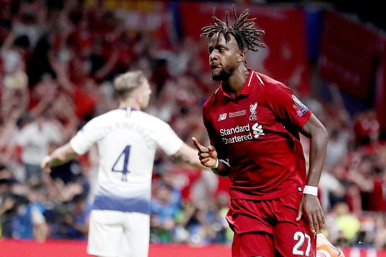 Liverpool striker Divock Origi celebrating after scoring the second goal in the 2-0 Champions League final win over Tottenham last Saturday. The Belgian has said that he is uncertain about his future at the Merseyside club despite making 21 appearanc