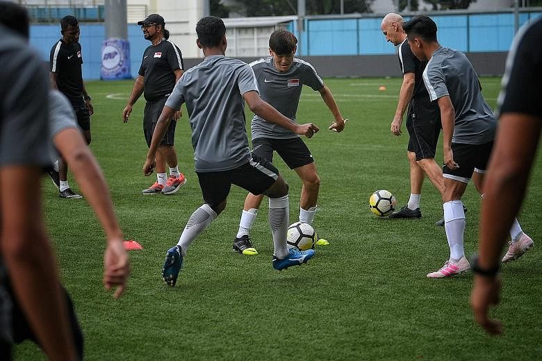 The Singapore Under-22 team training yesterday ahead of the Merlion Cup game against the Philippines at Jalan Besar Stadium tonight.