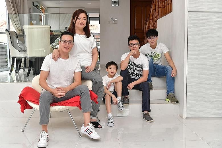 Mr Lim says his dream home is a freehold semi-detached house that is near nature and by the sea, with a big yard for gardening and a spacious corner. Mr Adrian Lim at home with his wife Jasmine and their three sons (from left) Ze Kai, eight, Yan Kai,